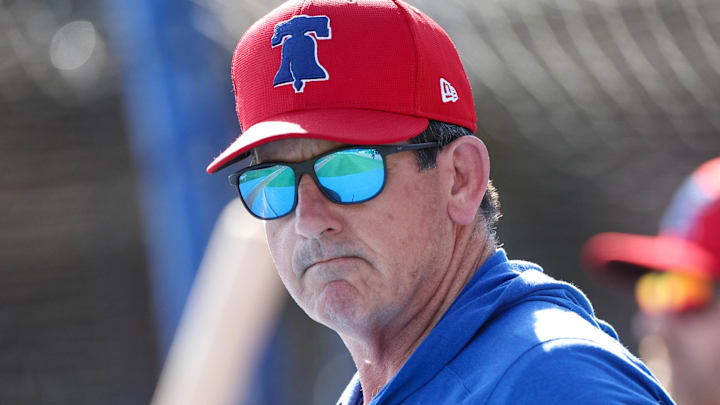 Feb 25, 2024; Clearwater, Florida, USA; Philadelphia Phillies manager Rob Thomson (59) directs batting practice before a game against the New York Yankees at BayCare Ballpark Feb 25, 2024; Clearwater, Florida, USA; Philadelphia Phillies manager Rob Thomson (59) directs batting practice before a game against the New York Yankees at BayCare Ballpark