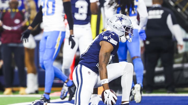 Dec 21, 2025; Arlington, Texas, USA; Dallas Cowboys wide receiver Ryan Flournoy (19) celebrates after catching a touchdown pass against the Los Angeles Chargers during the first quarter at AT&T Stadium. Mandatory Credit: Kevin Jairaj-Imagn Images