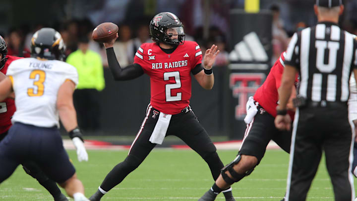 Sep 6, 2025; Lubbock, Texas, USA;  Texas Tech Red Raiders quarterback Behren Morton (2) passes against the Kent State Golden Flashes in the first half at Jones AT&T Stadium. Mandatory Credit: Michael C. Johnson-Imagn Images