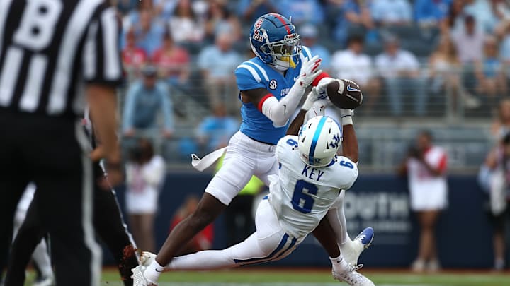 Sep 28, 2024; Oxford, Mississippi, USA; Mississippi Rebels defensive back Trey Amos (9) breaks up a pass intended for Kentucky Wildcats wide receiver Dane Key (6) during the first half at Vaught-Hemingway Stadium. Mandatory Credit: Petre Thomas-Imagn Images