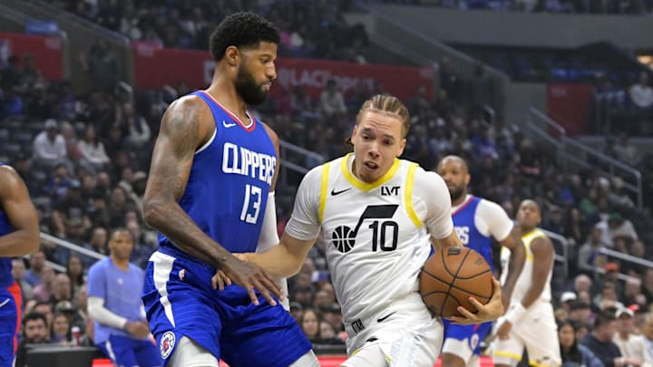 Apr 5, 2024; Los Angeles, California, USA; Utah Jazz guard Jason Preston (10) is defended by Los Angeles Clippers forward Paul George (13) in the first half at Crypto.com Arena. Mandatory Credit: Jayne Kamin-Oncea-Imagn Images Apr 5, 2024; Los Angeles, California, USA; Utah Jazz guard Jason Preston (10) is defended by Los Angeles Clippers forward Paul George (13) in the first half at Crypto.com Arena. Mandatory Credit: Jayne Kamin-Oncea-Imagn Images