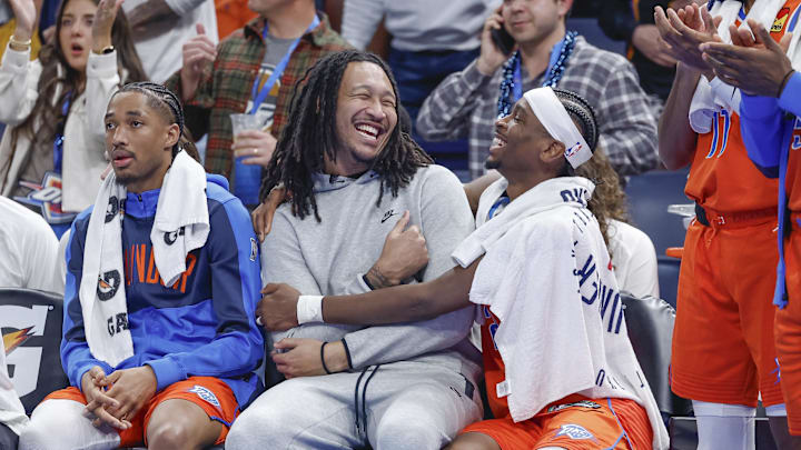 Nov 15, 2024; Oklahoma City, Oklahoma, USA; Oklahoma City Thunder forward Jaylin Williams (6) and guard Shai Gilgeous-Alexander (2) celebrate on the bench during the fourth quarter of a game against the Phoenix Suns at Paycom Center. Mandatory Credit: Alonzo Adams-Imagn Images