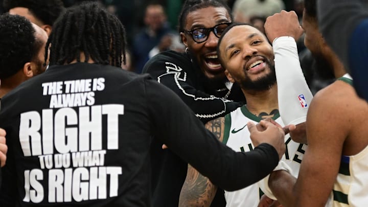 Milwaukee Bucks guard Damian Lillard celebrates with teammates after scoring the game-winning basket on Jan 14, 2024. Milwaukee Bucks guard Damian Lillard celebrates with teammates after scoring the game-winning basket on Jan 14, 2024.