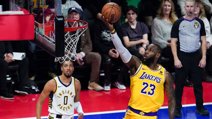 December 9, 2023; Las Vegas, Nevada, USA; Los Angeles Lakers forward LeBron James (23) shoots the basketball against Indiana Pacers guard Tyrese Haliburton (0) during the first quarter of the in-season tournament championship at T-Mobile Arena. Mandatory Credit: Kyle Terada-Imagn Images