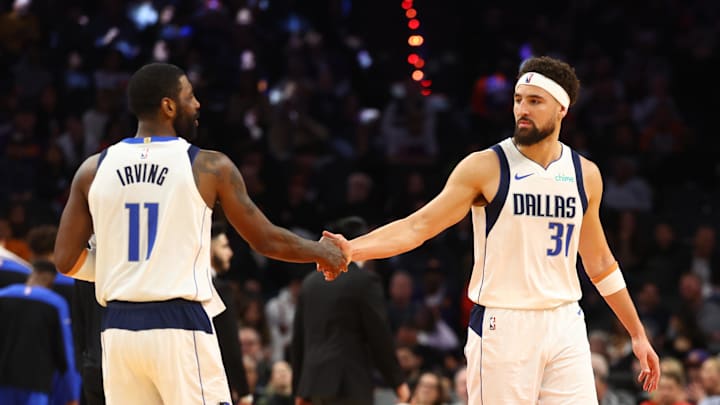 Dec 27, 2024; Phoenix, Arizona, USA; Dallas Mavericks guard Kyrie Irving (11) and Klay Thompson (31) against the Phoenix Suns at Footprint Center. Mandatory Credit: Mark J. Rebilas-Imagn Images Dec 27, 2024; Phoenix, Arizona, USA; Dallas Mavericks guard Kyrie Irving (11) and Klay Thompson (31) against the Phoenix Suns at Footprint Center. Mandatory Credit: Mark J. Rebilas-Imagn Images