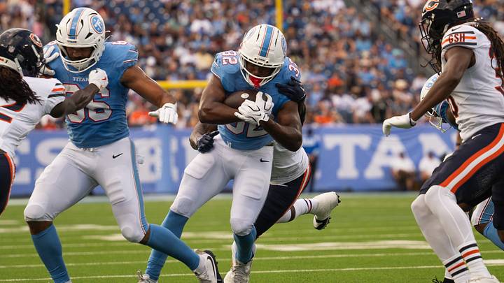Aug 29, 2026; Nashville, Tennessee, USA; Chicago Bears defensive end Jeremiah Martin (69) tackles Tennessee Titans running back Nicholas Singleton (32) during the first half at Nissan Stadium. Mandatory Credit: Steve Roberts-Imagn Images Aug 29, 2026; Nashville, Tennessee, USA; Chicago Bears defensive end Jeremiah Martin (69) tackles Tennessee Titans running back Nicholas Singleton (32) during the first half at Nissan Stadium. Mandatory Credit: Steve Roberts-Imagn Images