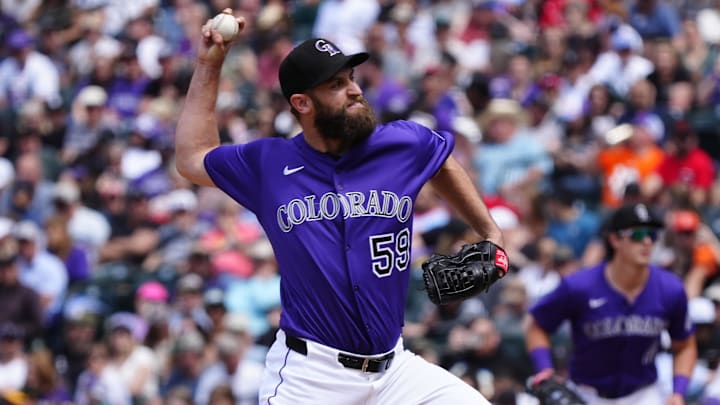 Apr 26, 2025; Denver, Colorado, USA; Colorado Rockies relief pitcher Jake Bird (59) delivers a pitch in the seventh inning against the Cincinnati Reds at Coors Field. Mandatory Credit: Ron Chenoy-Imagn Images