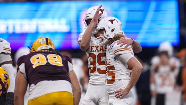 Texas Longhorns place kicker Bert Auburn and punter Michael Kern react after a missed field goal against Arizona State Texas Longhorns place kicker Bert Auburn and punter Michael Kern react after a missed field goal against Arizona State