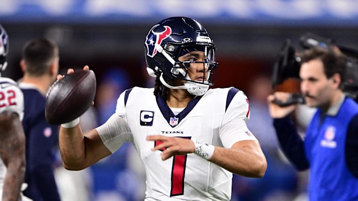 Jan 6, 2024; Indianapolis, Indiana, USA; Houston Texans quarterback C.J. Stroud (7) throws a pass to warm up before a game against the Indianapolis Colts at Lucas Oil Stadium. Mandatory Credit: Marc Lebryk-USA TODAY Sports