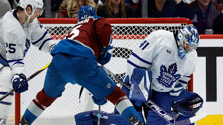 Mar 8, 2025; Denver, Colorado, USA; Toronto Maple Leafs goaltender Anthony Stolarz (41) makes a save against Colorado Avalanche right wing Valeri Nichushkin (13) in the third period at Ball Arena. Mandatory Credit: Isaiah J. Downing-Imagn Images