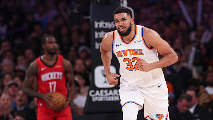 Feb 3, 2025; New York, New York, USA; New York Knicks center Karl-Anthony Towns (32) runs up court after a basket against the Houston Rockets during the first half at Madison Square Garden. Mandatory Credit: Vincent Carchietta-Imagn Images