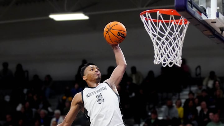 Millennium forward Cameron Holmes (3) dunks against Sunnyslope during a game at Millennium High School in Goodyear on Jan. 23, 2025. Millennium forward Cameron Holmes (3) dunks against Sunnyslope during a game at Millennium High School in Goodyear on Jan. 23, 2025.