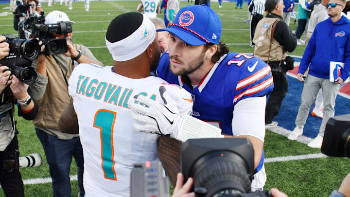 Buffalo Bills quarterback Josh Allen (17) greets Miami Dolphins quarterback Tua Tagovailoa (1) after a game at Highmark Stadium. 