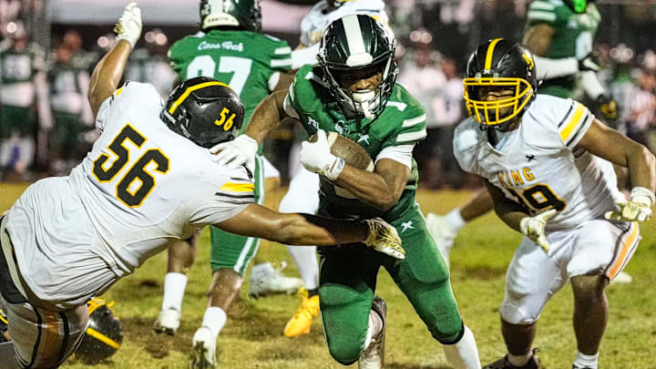 Detroit Cass Tech wide receiver Corey Sadler Jr (1) runs against King during the second half at Cass Tech High School in Detroit on Friday, Sept. 20, 2024.