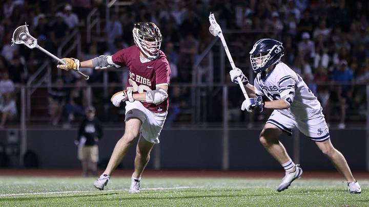 BC High's Nathan Rogers cradles the ball during a game vs. St. John's Prep in the Division 1 Final Four at Burlington High School on Tuesday, June 9, 2026. BC High's Nathan Rogers cradles the ball during a game vs. St. John's Prep in the Division 1 Final Four at Burlington High School on Tuesday, June 9, 2026.