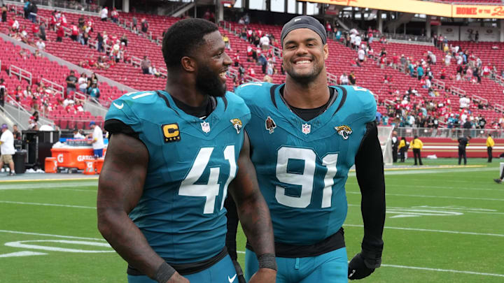 Sep 28, 2025; Santa Clara, California, USA; Jacksonville Jaguars defensive end Josh Hines-Allen (41) and defensive tackle Arik Armstead (91) after the game against the San Francisco 49ers at Levi's Stadium. Mandatory Credit: Darren Yamashita-Imagn Images
