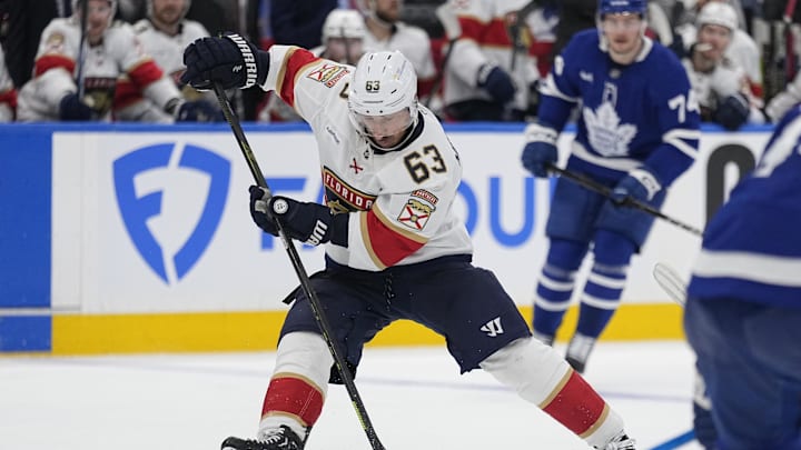 May 5, 2025; Toronto, Ontario, CAN; Florida Panthers forward Brad Marchand (63) controls the puck against the Toronto Maple Leafs during the second period of the second round of the 2025 Stanley Cup Playoffs at Scotiabank Arena. Mandatory Credit: John E. Sokolowski-Imagn Images May 5, 2025; Toronto, Ontario, CAN; Florida Panthers forward Brad Marchand (63) controls the puck against the Toronto Maple Leafs during the second period of the second round of the 2025 Stanley Cup Playoffs at Scotiabank Arena. Mandatory Credit: John E. Sokolowski-Imagn Images