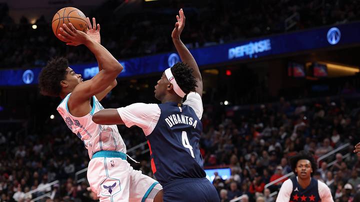 Oct 30, 2026; Washington, District of Columbia, USA; Charlotte Hornets guard Christian Anderson (5) shoots the ball and Washington Wizards forward AJ Dybantsa (4) defends in the first half in an NBA Cup game at Capital One Arena. Mandatory Credit: Geoff Burke-Imagn Images Oct 30, 2026; Washington, District of Columbia, USA; Charlotte Hornets guard Christian Anderson (5) shoots the ball and Washington Wizards forward AJ Dybantsa (4) defends in the first half in an NBA Cup game at Capital One Arena. Mandatory Credit: Geoff Burke-Imagn Images