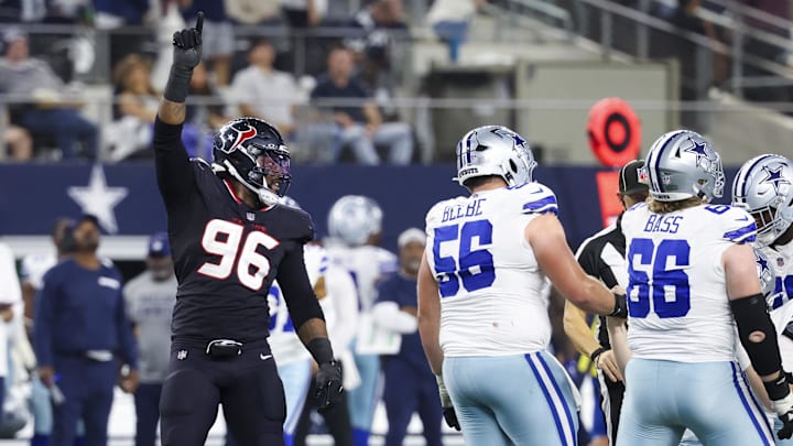 Nov 18, 2024; Arlington, Texas, USA; Houston Texans defensive end Denico Autry (96) reacts after a sack during the second half against the Dallas Cowboys at AT&T Stadium. Mandatory Credit: Kevin Jairaj-Imagn Images