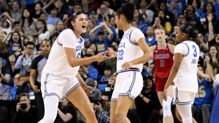 Mar 23, 2025; Los Angeles, California, USA; UCLA Bruins center Lauren Betts (51) celebrate scoring a basket with forward Kendall Dudley (22) in the third quarter against the Richmond Spiders during an NCAA Tournament second round game at Pauley Pavilion presented by Wescom. Mandatory Credit: Robert Hanashiro-Imagn Images Mar 23, 2025; Los Angeles, California, USA; UCLA Bruins center Lauren Betts (51) celebrate scoring a basket with forward Kendall Dudley (22) in the third quarter against the Richmond Spiders during an NCAA Tournament second round game at Pauley Pavilion presented by Wescom. Mandatory Credit: Robert Hanashiro-Imagn Images