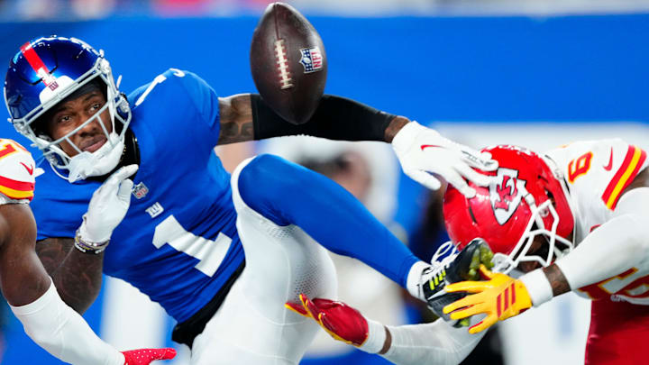 New York Giants wide receiver Malik Nabers (1) looks at a ball that was meant for him as he gets ready to fall in the end zone, in the fourth quarter, Sunday, September 21, 2025. Kansas City Chiefs cornerback Nohl Williams (20) and Kansas City Chiefs safety Bryan Cook (6) is shown on Nabers' sides. New York Giants wide receiver Malik Nabers (1) looks at a ball that was meant for him as he gets ready to fall in the end zone, in the fourth quarter, Sunday, September 21, 2025. Kansas City Chiefs cornerback Nohl Williams (20) and Kansas City Chiefs safety Bryan Cook (6) is shown on Nabers' sides.