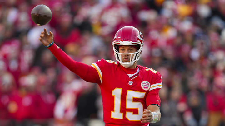 Nov 29, 2024; Kansas City, Missouri, USA; Kansas City Chiefs quarterback Patrick Mahomes (15) throws a pass during the first half against the Las Vegas Raiders at GEHA Field at Arrowhead Stadium.