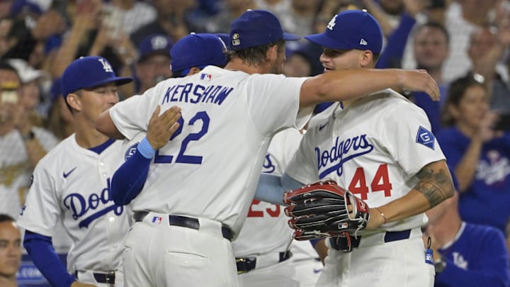 Dodgers starting pitcher Clayton Kershaw (22) is congratulated after his 3000th career strikeout in the fifth inning against the Chicago White Sox at Dodger Stadium on July 2.