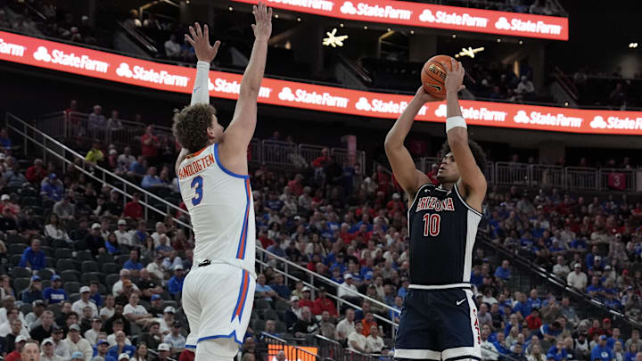 Nov 3, 2025; Las Vegas, NV, USA; Arizona Wildcats forward Koa Peat (10) shoots against Florida Gators center Micah Handlogten (3) during the second half of the Hall of Fame Series game at T-Mobile Arena. Mandatory Credit: Candice Ward-Imagn Images