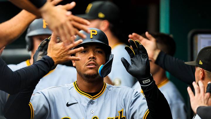Jul 31, 2026; Cincinnati, Ohio, USA; Pittsburgh Pirates outfielder Esmerlyn Valdez (55) high fives teammates after scoring on a two-run single hit by third baseman Nick Gonzales (not pictured) in the first inning against the Cincinnati Reds at Great American Ball Park. Mandatory Credit: Katie Stratman-Imagn Images Jul 31, 2026; Cincinnati, Ohio, USA; Pittsburgh Pirates outfielder Esmerlyn Valdez (55) high fives teammates after scoring on a two-run single hit by third baseman Nick Gonzales (not pictured) in the first inning against the Cincinnati Reds at Great American Ball Park. Mandatory Credit: Katie Stratman-Imagn Images