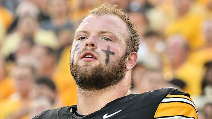 Sep 13, 2025; Iowa City, Iowa, USA; Iowa Hawkeyes offensive lineman Logan Jones (65) looks on before the game against the Massachusetts Minutemen at Kinnick Stadium. Mandatory Credit: Jeffrey Becker-Imagn Images