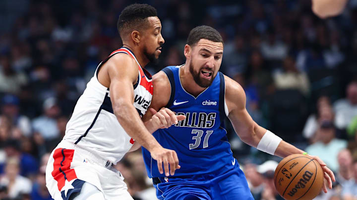 Oct 24, 2025; Dallas, Texas, USA; Dallas Mavericks guard Klay Thompson (31) drives to the basket as Washington Wizards guard CJ McCollum (3) defends during the first quarter at American Airlines Center. Mandatory Credit: Kevin Jairaj-Imagn Images Oct 24, 2025; Dallas, Texas, USA; Dallas Mavericks guard Klay Thompson (31) drives to the basket as Washington Wizards guard CJ McCollum (3) defends during the first quarter at American Airlines Center. Mandatory Credit: Kevin Jairaj-Imagn Images