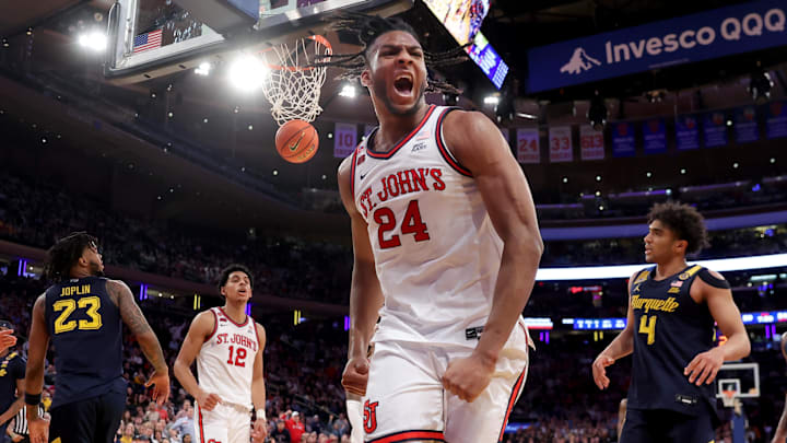 Mar 14, 2025; New York, NY, USA; St. John's basketball forward Zuby Ejiofor (24) reacts after a basket and a foul during the second half against the Marquette Golden Eagles at Madison Square Garden.