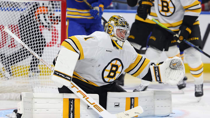 Apr 21, 2026; Buffalo, New York, USA; Boston Bruins goaltender Jeremy Swayman (1) looks top make a save during the second period against the Buffalo Sabres in game two of the first round of the 2026 Stanley Cup Playoffs at KeyBank Center. Mandatory Credit: Timothy T. Ludwig-Imagn Images