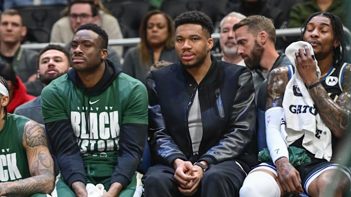 Feb 22, 2026; Milwaukee, Wisconsin, USA; Milwaukee Bucks forward Giannis Antetokounmpo (34) looks on from the bench in the second quarter against the Toronto Raptors as he recovers from a calf injury at Fiserv Forum. Mandatory Credit: Benny Sieu-Imagn Images