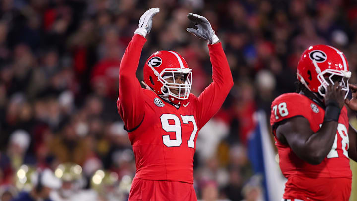 Nov 29, 2024; Athens, Georgia, USA; Georgia Bulldogs defensive lineman Warren Brinson (97) shows emotion against the Georgia Tech Yellow Jackets in the first quarter at Sanford Stadium. Mandatory Credit: Brett Davis-Imagn Images