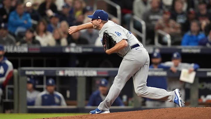 Oct 17, 2021; Cumberland, Georgia, USA; Los Angeles Dodgers starting pitcher Max Scherzer (31) pitching against the Atlanta Braves during the second inning in game two of the 2021 NLCS at Truist Park. Mandatory Credit: Dale Zanine-Imagn Images Oct 17, 2021; Cumberland, Georgia, USA; Los Angeles Dodgers starting pitcher Max Scherzer (31) pitching against the Atlanta Braves during the second inning in game two of the 2021 NLCS at Truist Park. Mandatory Credit: Dale Zanine-Imagn Images