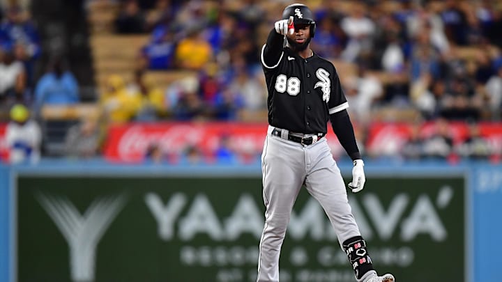 Jun 14, 2023; Los Angeles, California, USA; Chicago White Sox center fielder Luis Robert Jr. (88) reaches second on a double against the Los Angeles Dodgers during the ninth inning at Dodger Stadium. Mandatory Credit: Gary A. Vasquez-Imagn Images