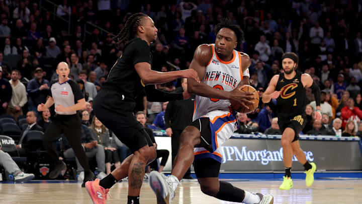 Apr 11, 2025; New York, New York, USA; New York Knicks forward OG Anunoby (8) drives to the basket against Cleveland Cavaliers guard Darius Garland (10) during the fourth quarter at Madison Square Garden. Mandatory Credit: Brad Penner-Imagn Images