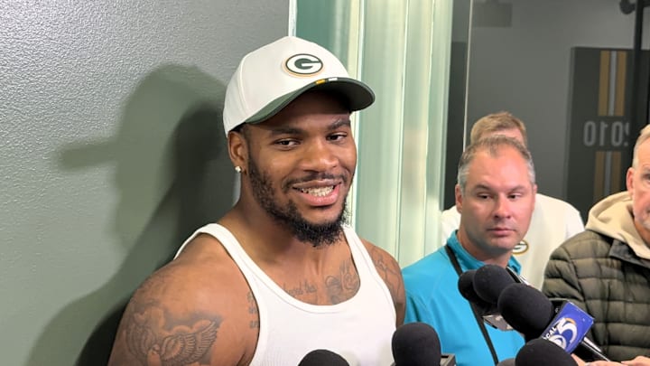 Micah Parsons talks to reporters on Thursday outside the Lambeau Field locker room.