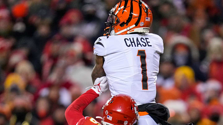 Cincinnati Bengals wide receiver Ja'Marr Chase (1) makes a leaping catch over Kansas City Chiefs safety Bryan Cook (6) in the fourth quarter of the AFC championship NFL game between the Cincinnati Bengals and the Kansas City Chiefs, Sunday, Jan. 29, 2023, at Arrowhead Stadium in Kansas City, Mo. The Kansas City Chiefs advanced to the Super Bowl with a 23-20 win over the Bengals. Cincinnati Bengals wide receiver Ja'Marr Chase (1) makes a leaping catch over Kansas City Chiefs safety Bryan Cook (6) in the fourth quarter of the AFC championship NFL game between the Cincinnati Bengals and the Kansas City Chiefs, Sunday, Jan. 29, 2023, at Arrowhead Stadium in Kansas City, Mo. The Kansas City Chiefs advanced to the Super Bowl with a 23-20 win over the Bengals.