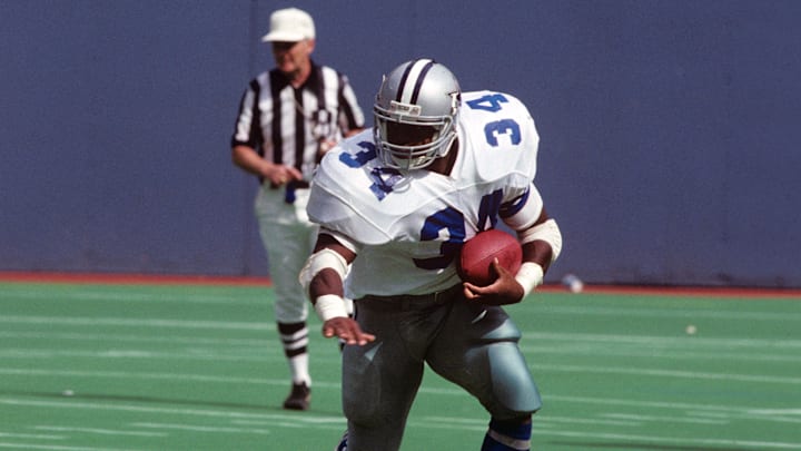 Sep 4, 1988;  Pittsburgh, PA,USA; FILE PHOTO; Dallas Cowboys running back HERSCHEL WALKER (34) runs with the ball against the Pittsburgh Steelers at Three River Stadium. The Steelers beat the Cowboys 24-21. Mandatory Credit: Malcolm Emmons-Imagn Images