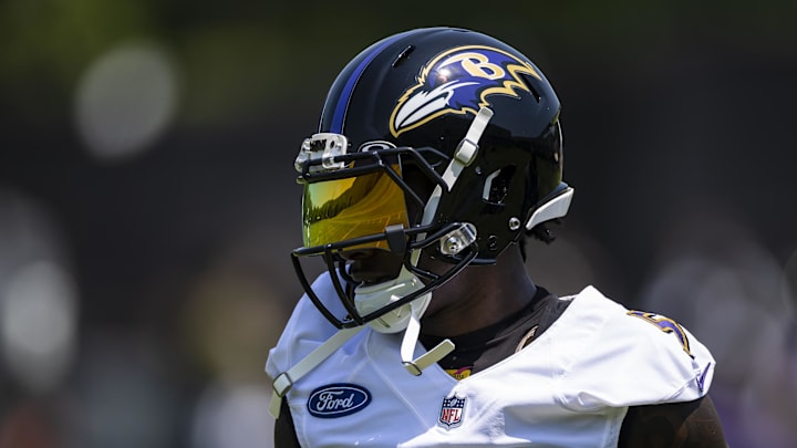 May 26, 2021; Owings Mills, Maryland, USA; Baltimore Ravens wide receiver Marquise Brown (5) looks on during an OTA at Under Armour Performance Center. Mandatory Credit: Scott Taetsch-Imagn Images