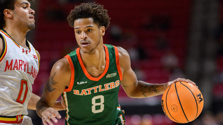 Florida A&M Rattlers forward O'Neal drives to the basket against Maryland Terrapins guard Gillespie at Xfinity Center. 