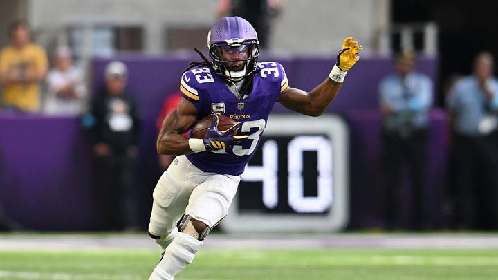 Minnesota Vikings running back Aaron Jones (33) rushes during the second quarter against the Miami Dolphins at U.S. Bank Stadium. Minnesota Vikings running back Aaron Jones (33) rushes during the second quarter against the Miami Dolphins at U.S. Bank Stadium.