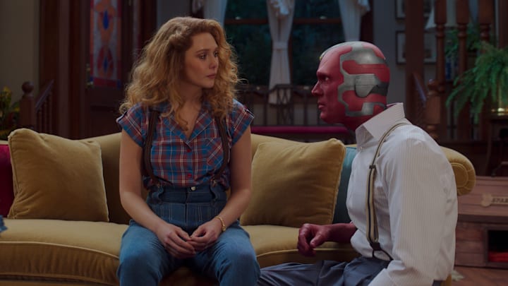 Elizabeth Olsen as Wanda Maximoff and Paul Bettany as Vision in Marvel Studios' WANDAVISION. Photo courtesy of Marvel Studios. ©Marvel Studios 2021. All Rights Reserved.