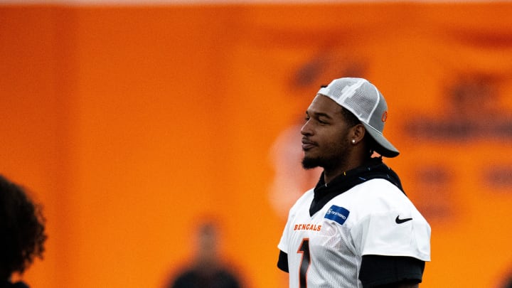 Cincinnati Bengals wide receiver Ja'Marr Chase (1) stretches with his teammates at Bengals spring practice at the IEL Indoor Facility in Cincinnati on Wednesday, June 12, 2024. Cincinnati Bengals wide receiver Ja'Marr Chase (1) stretches with his teammates at Bengals spring practice at the IEL Indoor Facility in Cincinnati on Wednesday, June 12, 2024.