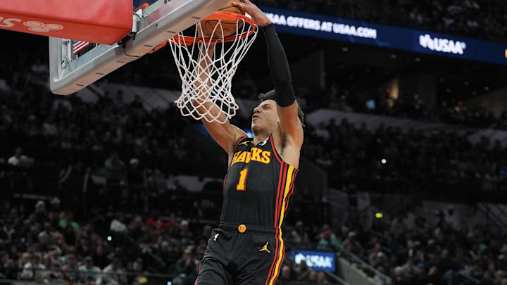 Dec 19, 2024; San Antonio, Texas, USA;  Atlanta Hawks forward Jalen Johnson (1) dunks the ball in the second half against the San Antonio Spurs at Frost Bank Center. Mandatory Credit: Daniel Dunn-Imagn Images