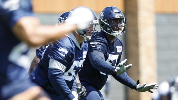 May 23, 2022; Renton, WA, USA; Seattle Seahawks offensive lineman Charles Cross (67) participates in an OTA workout at the Virginia Mason Athletic Center. Mandatory Credit: Joe Nicholson-USA TODAY Sports