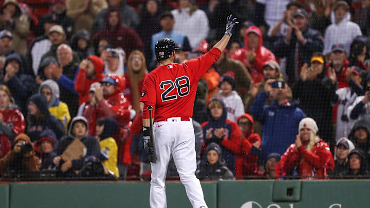 Boston Red Sox designated hitter JD Martinez (28) waves to the crowd after being taken out of the game during the eighth inning against the Tampa Bay Rays at Fenway Park in 2022.