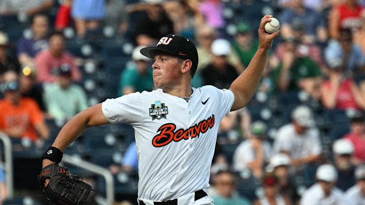 Jun 15, 2025; Omaha, Neb, USA; Oregon State Beavers starting pitcher Ethan Kleinschmit (24) throws against the Coastal Carolina Chanticleers during the first inning at Charles Schwab Field. Mandatory Credit: Steven Branscombe-Imagn Images Jun 15, 2025; Omaha, Neb, USA; Oregon State Beavers starting pitcher Ethan Kleinschmit (24) throws against the Coastal Carolina Chanticleers during the first inning at Charles Schwab Field. Mandatory Credit: Steven Branscombe-Imagn Images